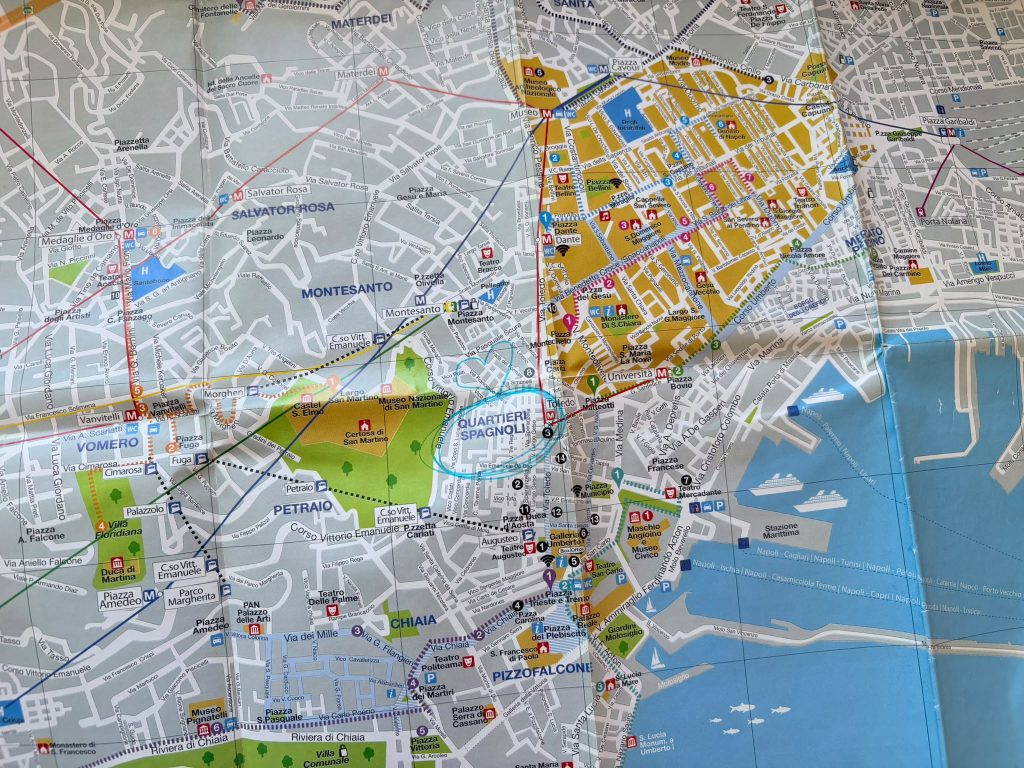 A worn tourist map of Naples with the Quartieri Spagnoli circled in blue pen
